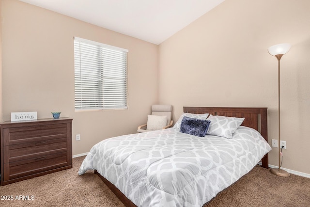 bedroom with light carpet and lofted ceiling