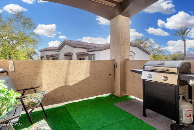 view of patio / terrace with a balcony