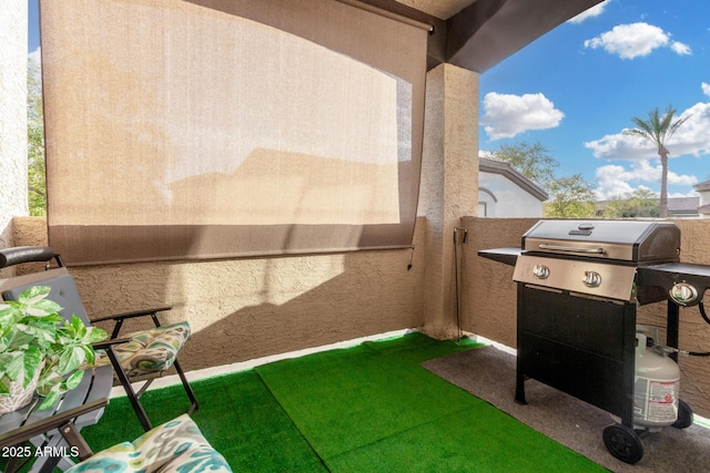 view of patio / terrace with a balcony