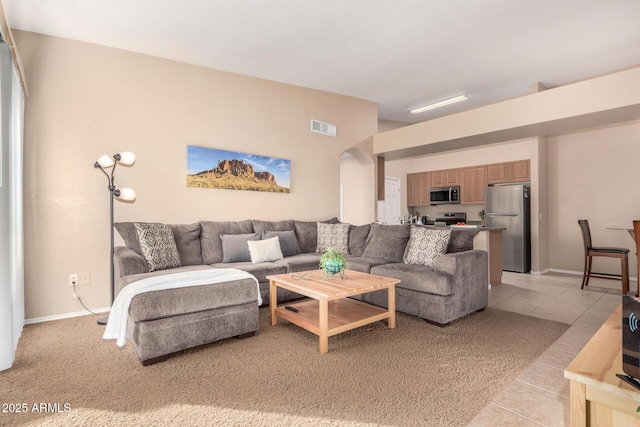 living room featuring light tile patterned floors