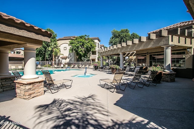 view of pool featuring a pergola and a patio