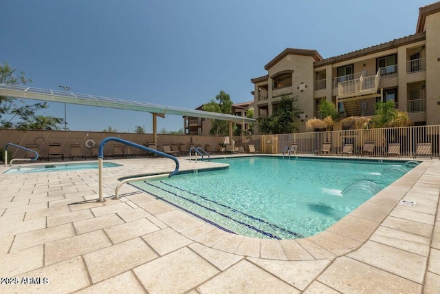 view of pool featuring a patio area