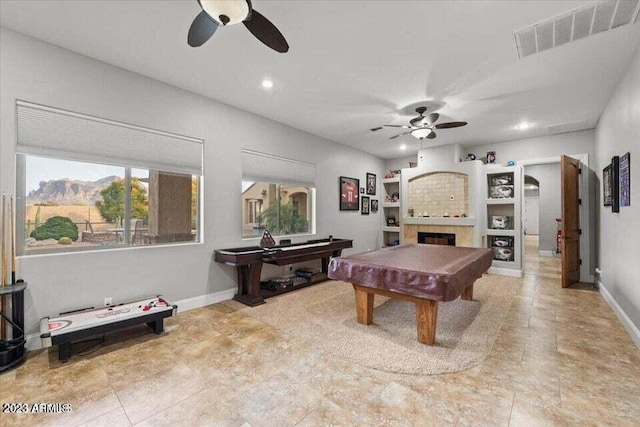 playroom with light tile flooring, pool table, and ceiling fan