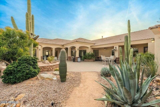 view of front of home with a patio