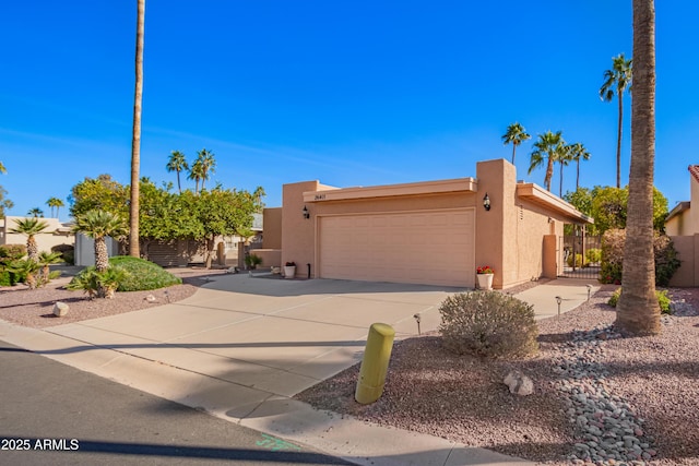 adobe home featuring a garage