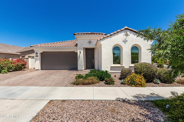 4051 S Galaxy Ln, Mesa, AZ 85212 - mediterranean / spanish home featuring a tile roof, stucco siding, and driveway