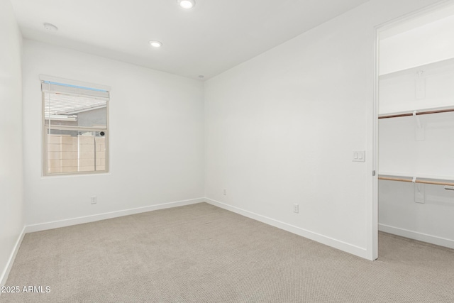 4051 S Galaxy Ln, Mesa, AZ 85212 - unfurnished bedroom with recessed lighting, light carpet, baseboards, a spacious closet, and a closet