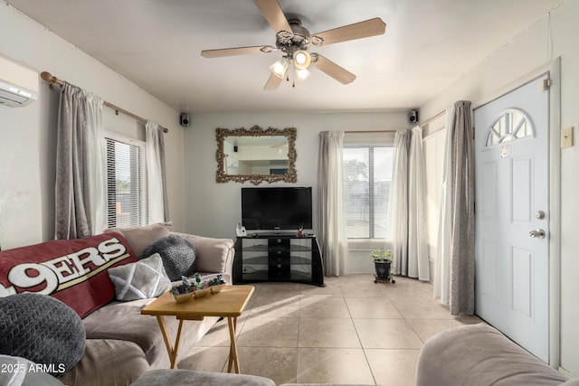 tiled living room with a wall mounted AC and ceiling fan