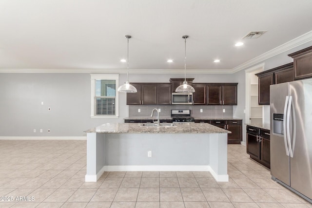 kitchen featuring decorative backsplash, dark brown cabinetry, a sink, light tile patterned floors, and stainless steel appliances