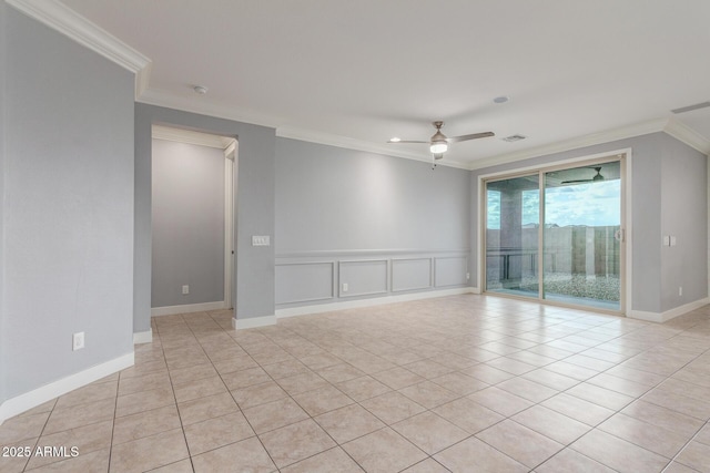 spare room with crown molding, baseboards, ceiling fan, and light tile patterned floors