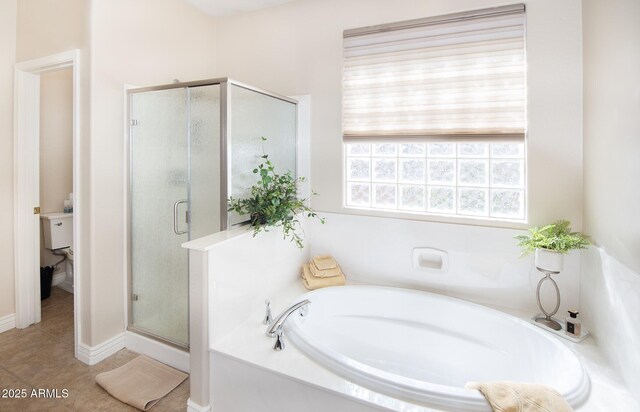 6975 E Lynx Wagon Rd, Prescott Valley, AZ 86314 - bathroom with tile patterned flooring, a shower stall, and a garden tub