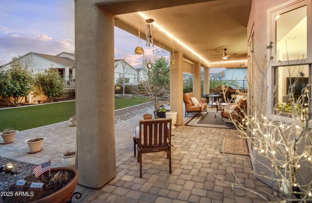 6975 E Lynx Wagon Rd, Prescott Valley, AZ 86314 - view of patio / terrace featuring a fenced backyard and ceiling fan