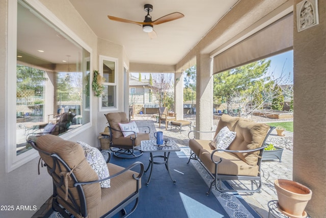 6975 E Lynx Wagon Rd, Prescott Valley, AZ 86314 - view of patio / terrace featuring ceiling fan, fence, and an outdoor hangout area