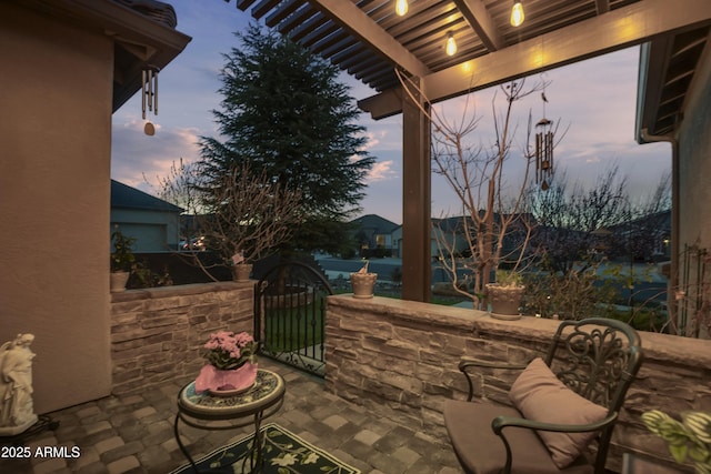 6975 E Lynx Wagon Rd, Prescott Valley, AZ 86314 - patio terrace at dusk with a gate