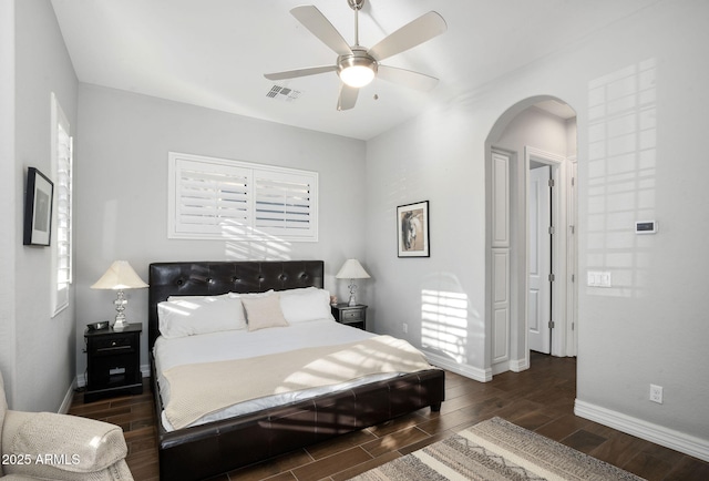 bedroom featuring multiple windows and ceiling fan