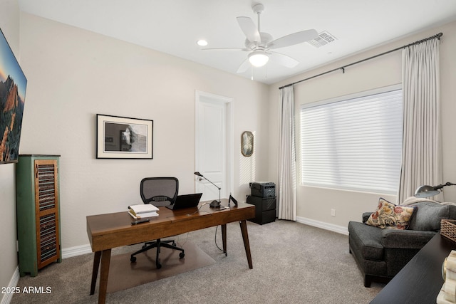 office featuring beverage cooler, light carpet, and ceiling fan