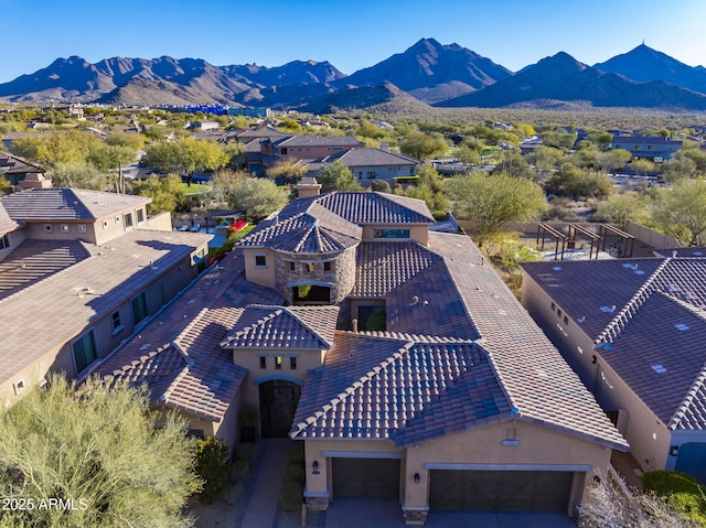 bird's eye view with a mountain view