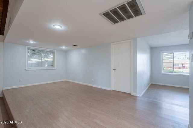 405 E Stanford Ave, Gilbert, AZ 85234 - unfurnished room featuring light wood-type flooring, baseboards, and recessed lighting