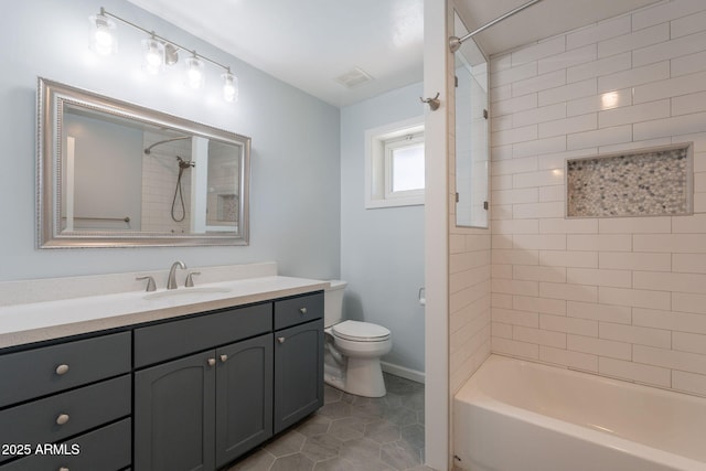 405 E Stanford Ave, Gilbert, AZ 85234 - bathroom with toilet, vanity, tile patterned floors,  shower combination, and baseboards