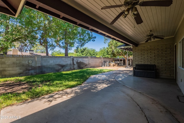 405 E Stanford Ave, Gilbert, AZ 85234 - fenced backyard with a ceiling fan and a patio