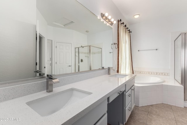 bathroom featuring plus walk in shower, tile patterned flooring, and vanity