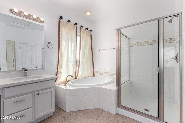 bathroom with vanity, tile patterned floors, and independent shower and bath