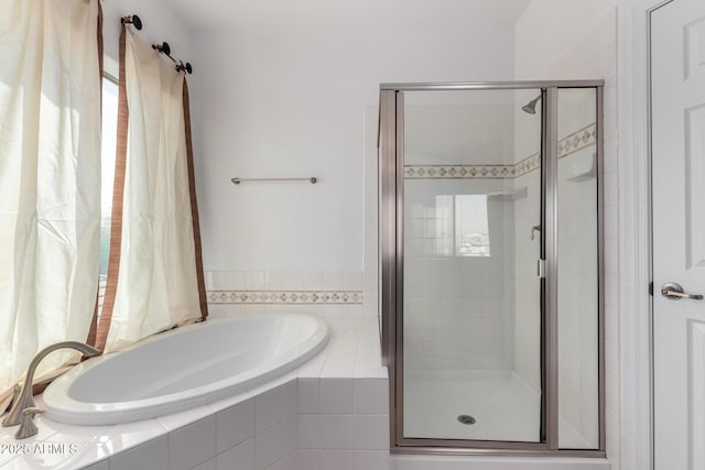 bathroom with independent shower and bath