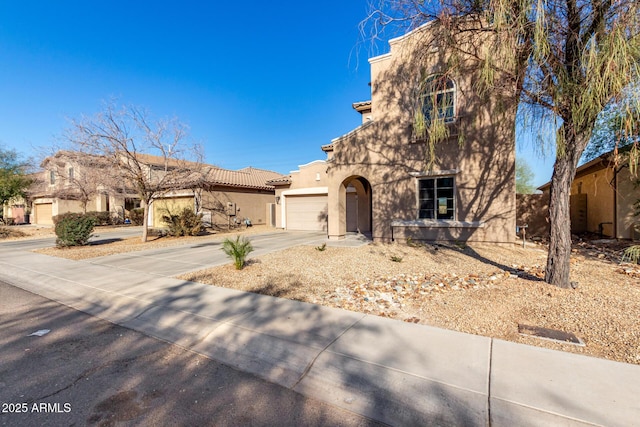 view of front of home with a garage