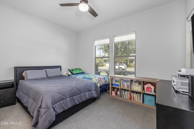 bedroom featuring ceiling fan and carpet flooring