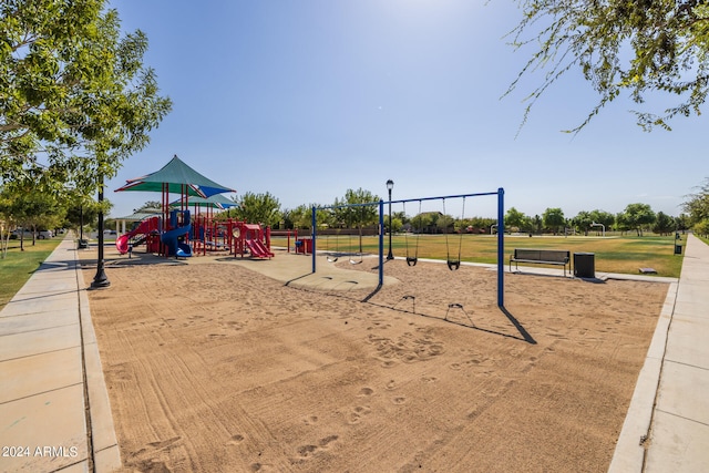 view of jungle gym featuring a yard