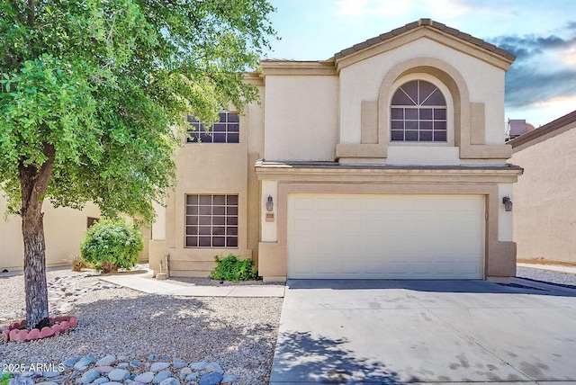 view of front of home with a garage