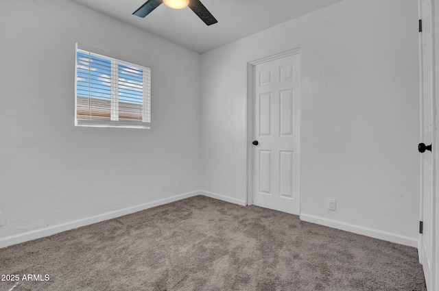 unfurnished bedroom with ceiling fan, carpet floors, and baseboards