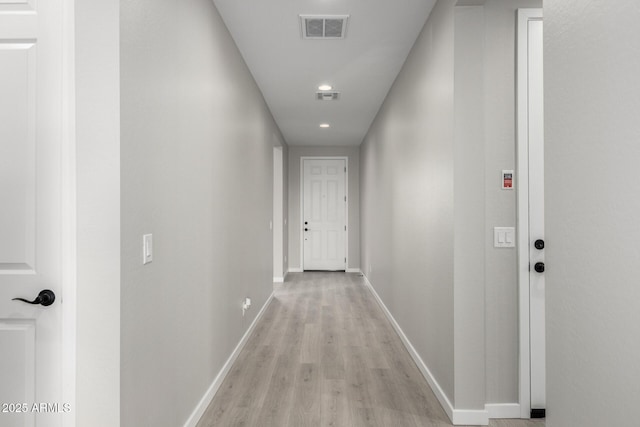 hallway featuring light hardwood / wood-style flooring