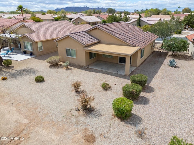 bird's eye view with a mountain view and a residential view