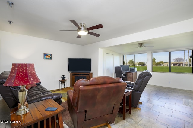 living room featuring ceiling fan