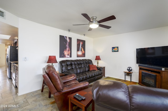 living room with ceiling fan