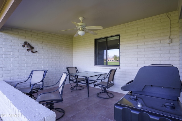 view of patio / terrace with grilling area and ceiling fan