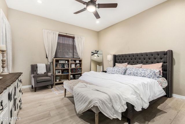 bedroom with light wood-type flooring, recessed lighting, baseboards, and a ceiling fan