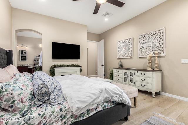 bedroom with a ceiling fan, visible vents, light wood-type flooring, baseboards, and recessed lighting