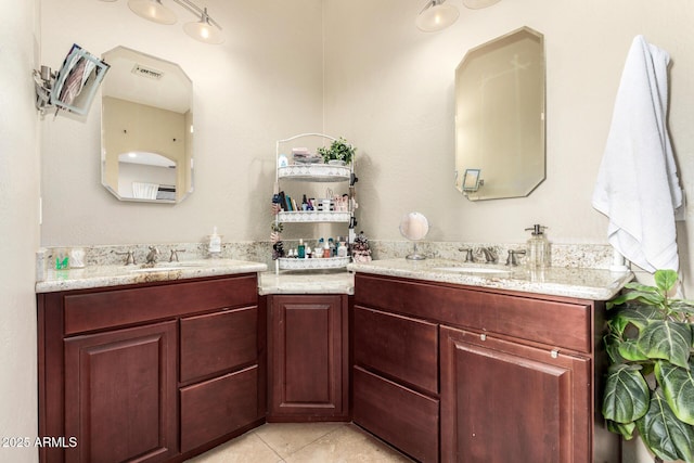 full bathroom featuring tile patterned floors, visible vents, and vanity