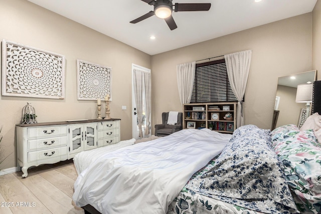 bedroom with light wood-style floors, baseboards, ceiling fan, and recessed lighting