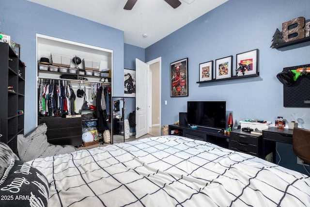 bedroom with ceiling fan and a closet