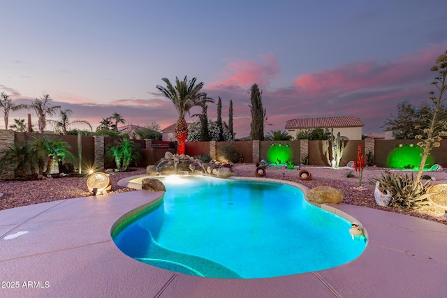 31453 N Blackfoot Dr, San Tan Valley, AZ 85143 - view of swimming pool with a fenced backyard and a patio area