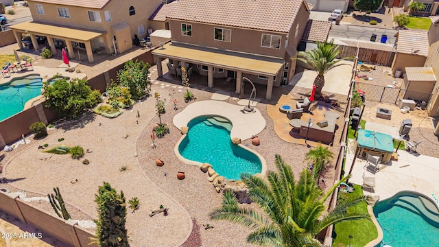 31453 N Blackfoot Dr, San Tan Valley, AZ 85143 - view of pool featuring a fenced backyard and a patio area