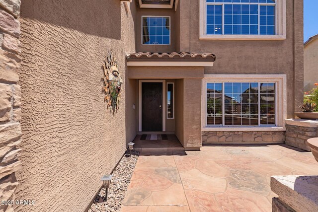 31453 N Blackfoot Dr, San Tan Valley, AZ 85143 - view of exterior entry with stucco siding