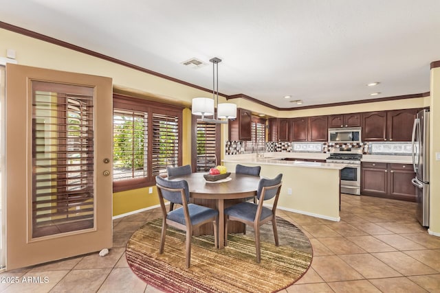 31453 N Blackfoot Dr, San Tan Valley, AZ 85143 - dining room featuring light tile patterned floors, ornamental molding, and recessed lighting