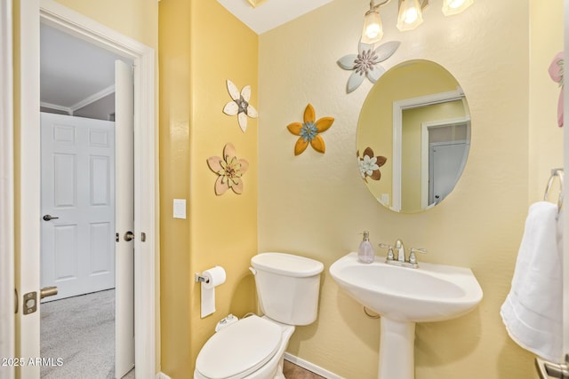 31453 N Blackfoot Dr, San Tan Valley, AZ 85143 - half bathroom featuring toilet and ornamental molding