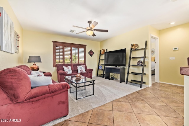 31453 N Blackfoot Dr, San Tan Valley, AZ 85143 - tiled living room featuring ceiling fan, baseboards, and carpet flooring