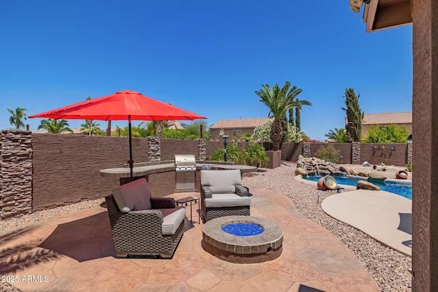 31453 N Blackfoot Dr, San Tan Valley, AZ 85143 - fenced backyard with a patio area and a fire pit