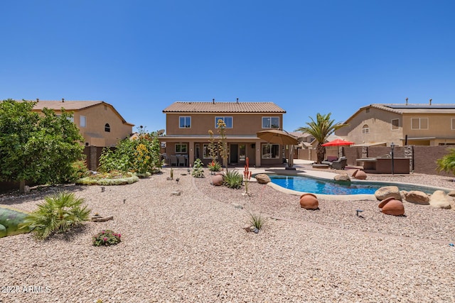31453 N Blackfoot Dr, San Tan Valley, AZ 85143 - rear view of house with a fenced backyard, a patio, an outdoor pool, and stucco siding